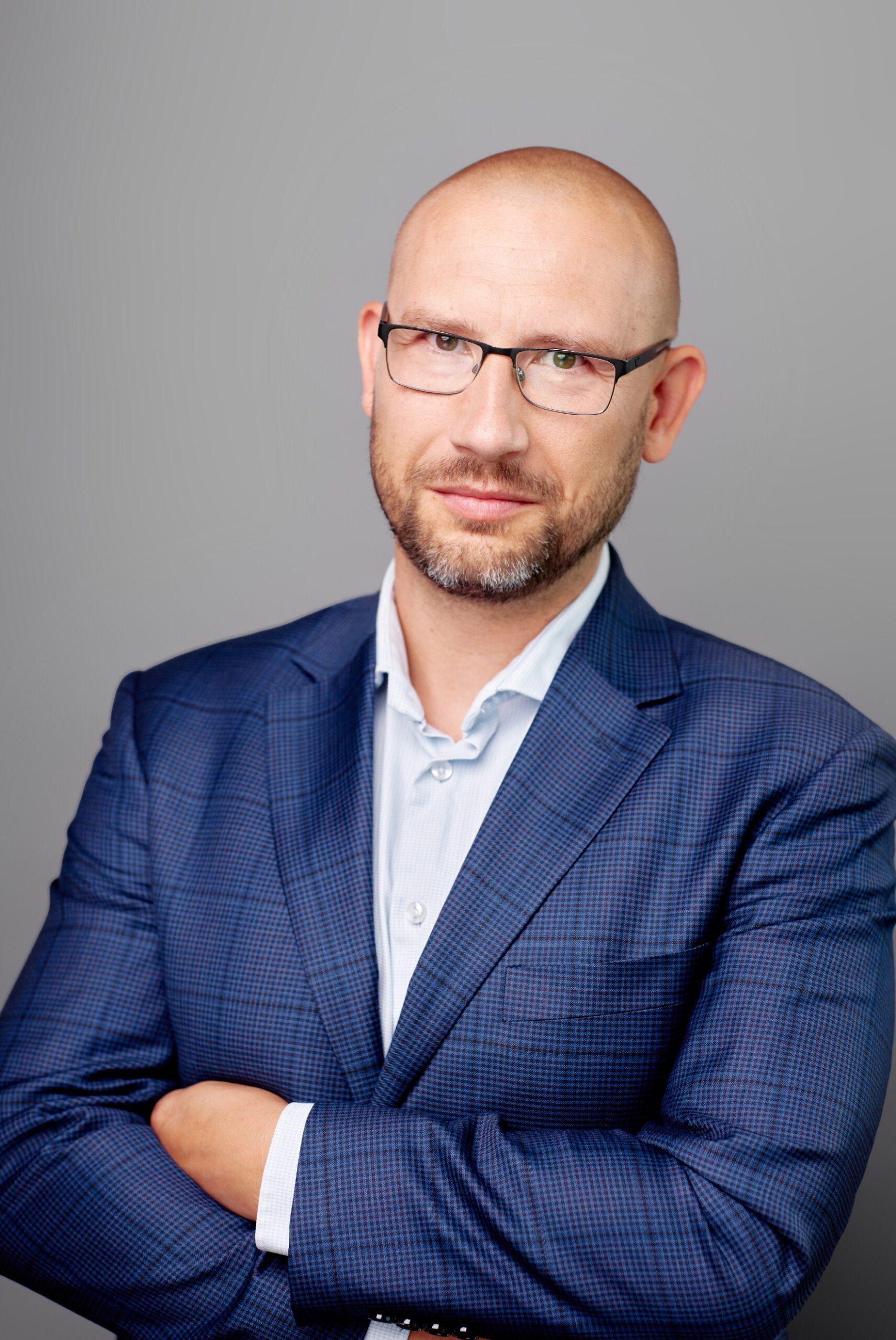 Piotr Woźniakiewicz, PwC