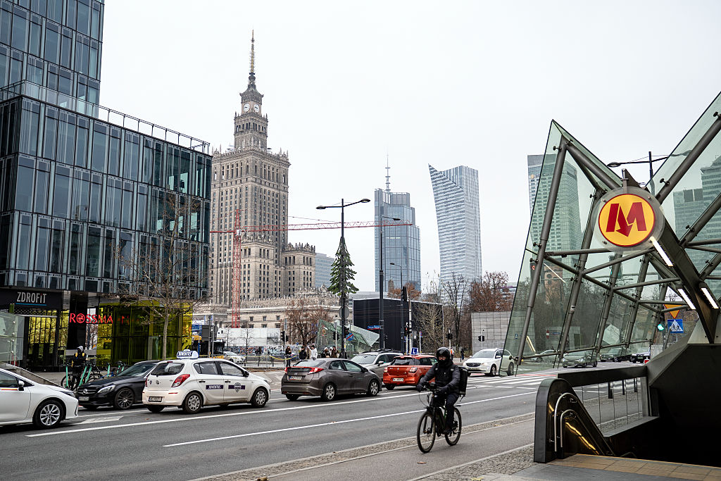 Traffic near a subway station entrance in Warsaw, Poland