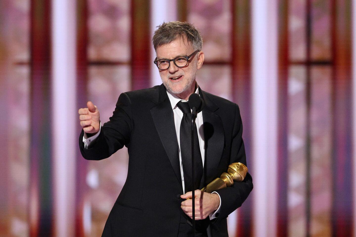 Paul Thomas Anderson ze statuetką Złotego Globu