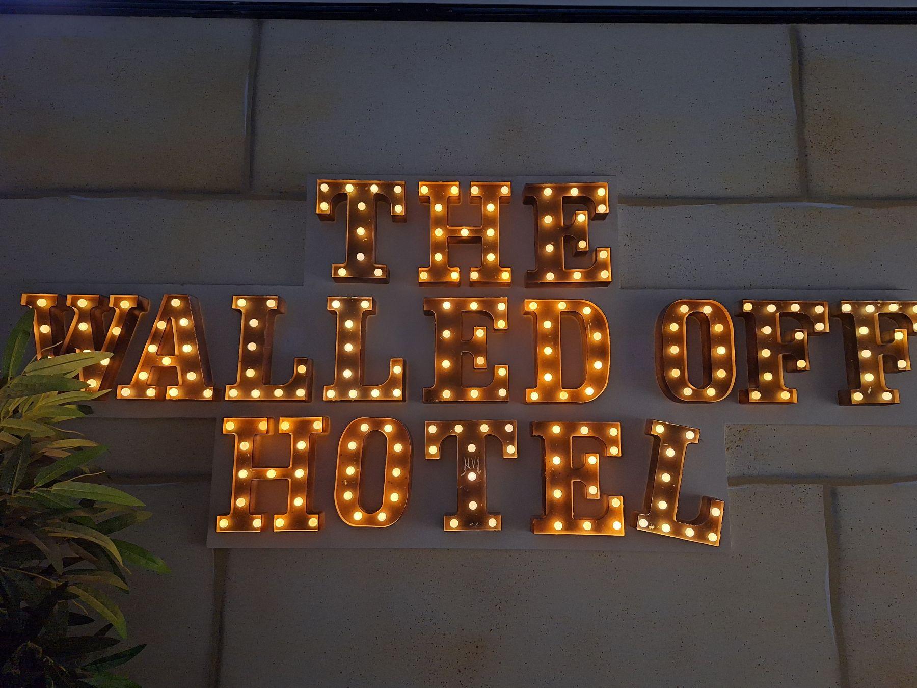 Neon The Walled Off Hotel