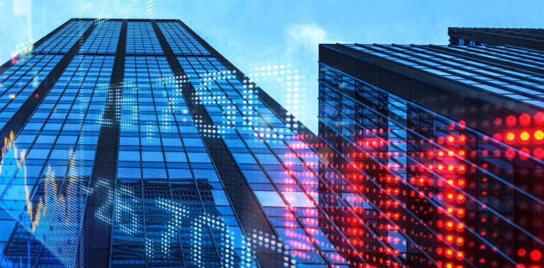 Modern Skyscrapers with Overlayed Financial Graphs and Stock Market Trends